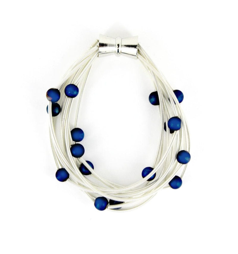 Sea Lily Bracelets Silver Piano Wire Bracelet w. Blue Beads